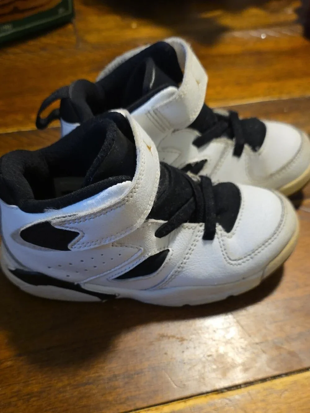 Jordan Kids' White and Black High-Top Sneakers with Gold Jumpman